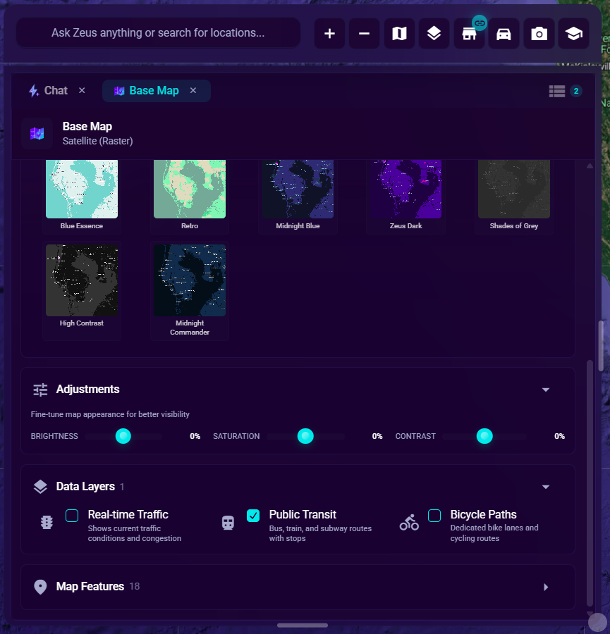 The Brightness, Saturation, and Contrast sliders in the Adjustments card, below the theme grid in the Base Map tab